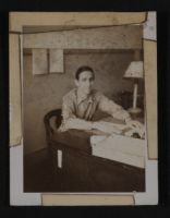 CWJ Phelps Sitting at Desk Photograph