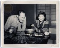 American Counsel with Japanese Woman Preparing Meal
